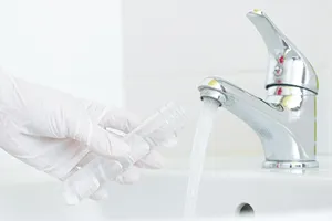 water faucet that's turned on
